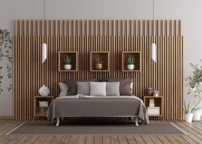 Modern bedroom with double bed against architectural wood paneling